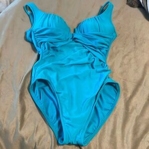 Miracle suit bathing suit- one piece. Work about 6-7 times. Size 12.